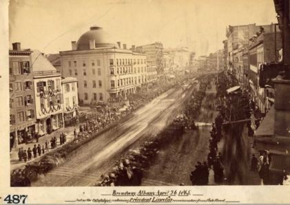 Procession on Broadway, moving toward the photographer